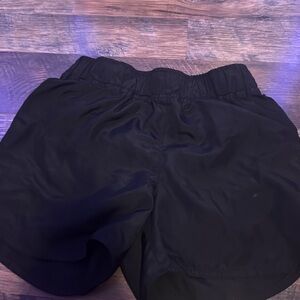 Black,worn, athletics shorts
